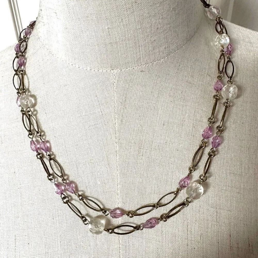 Pink and gold tone long beaded necklace
